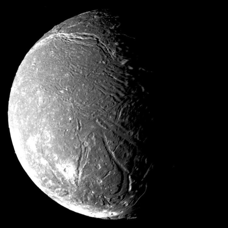 Mosaic of Uranus's moon Ariel photographed by Voyager 2 in 1986, showing its cratered, fractured surface.